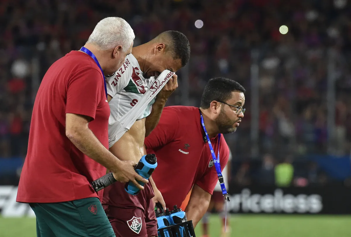 106706820-fluminenses-midfielder-andre-trindade-reacts-as-he-leaves-the-pitch-after-being-injur